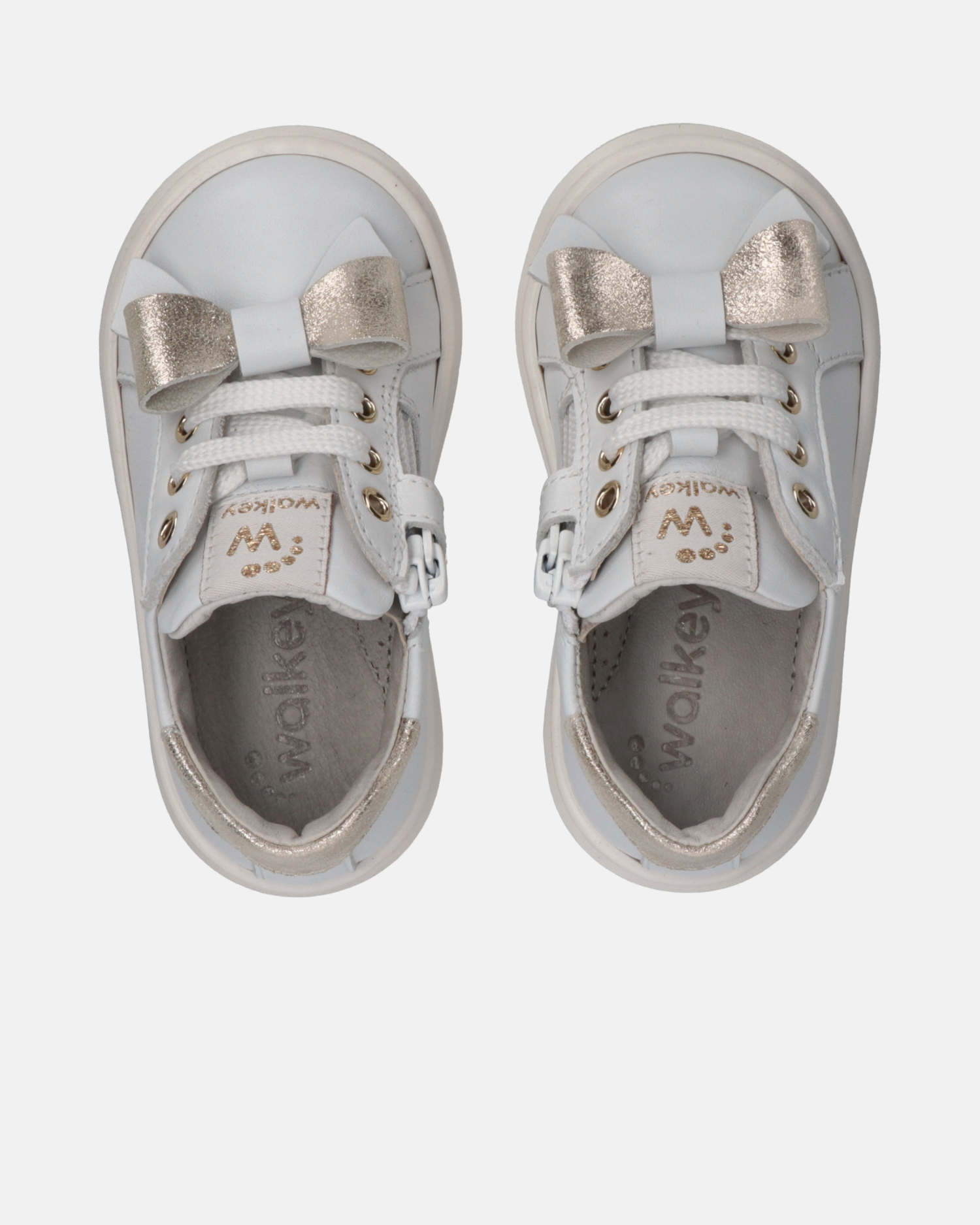 Sneakers primi passi in pelle con fiocchi