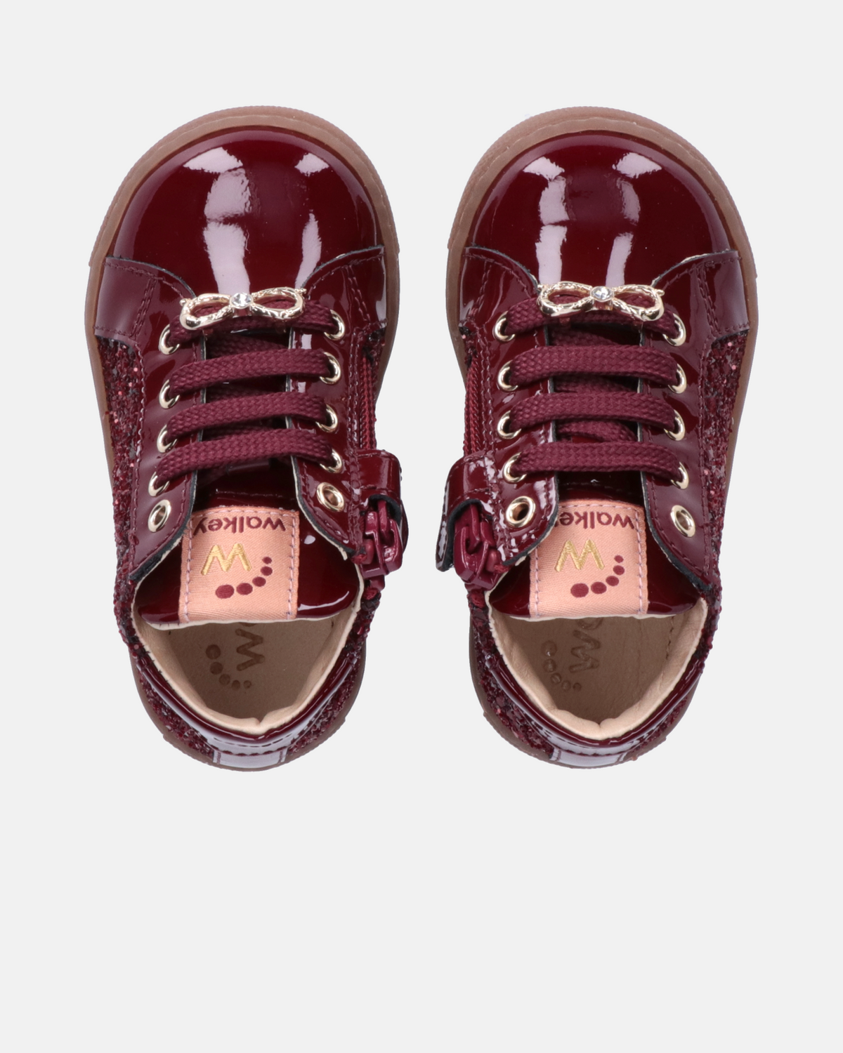 Sneakers bambina in vernice con glitter e fiocco gioiello