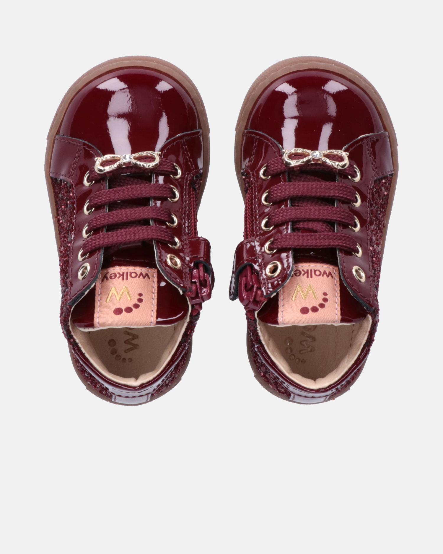 Sneakers bambina in vernice con glitter e fiocco gioiello