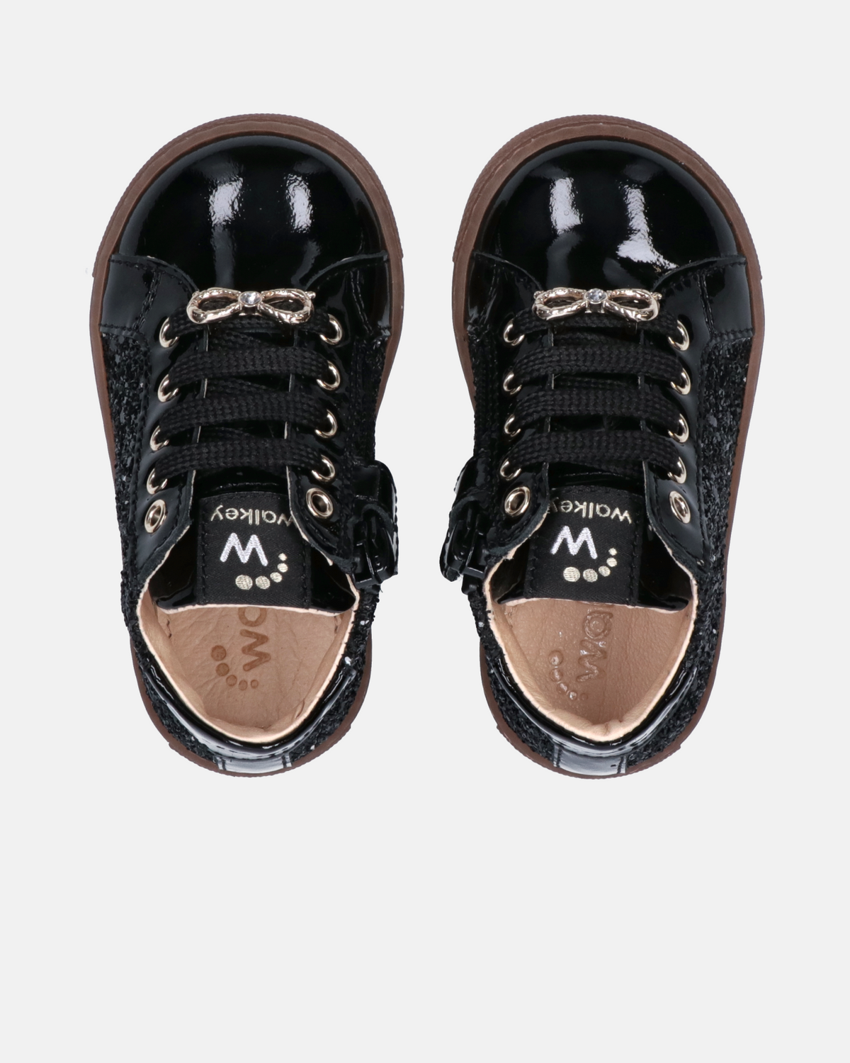 Sneakers bambina in vernice con glitter e fiocco gioiello